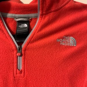orange north face 1/4 zip